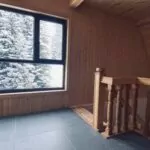 Top floor and staircase with snowy winter view at Terrace Bakhmaro