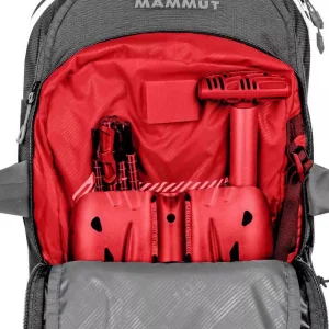 A Mammut Pro 35 Removable Airbag 3.0 35L is open to show the shovel and probe inside - all of which are available for cat skiing rental